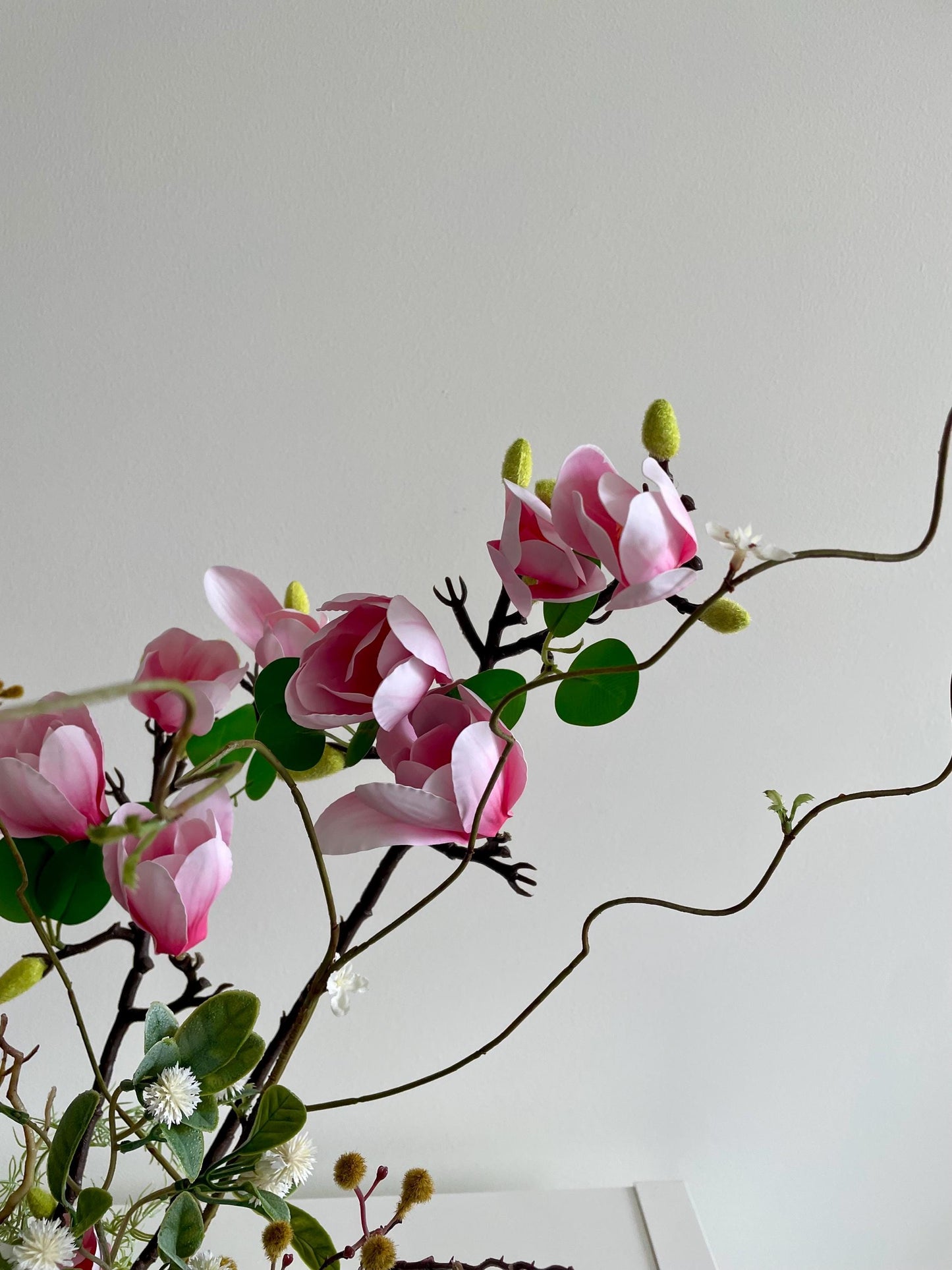 Silk Magnolia Centerpiece: Japanese Minimalist Floral Arrangement in Wood Vase