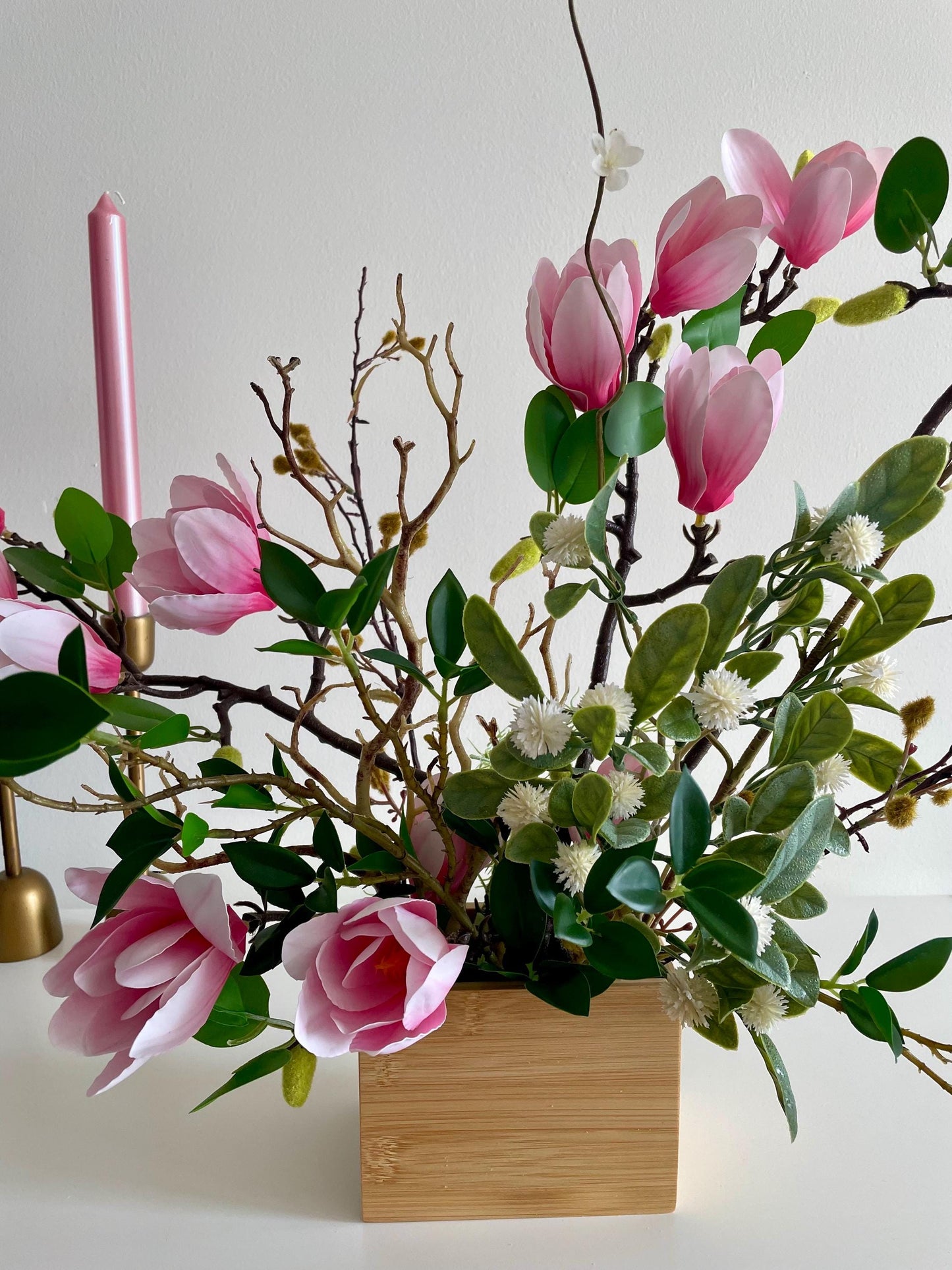 Silk Magnolia Centerpiece: Japanese Minimalist Floral Arrangement in Wood Vase