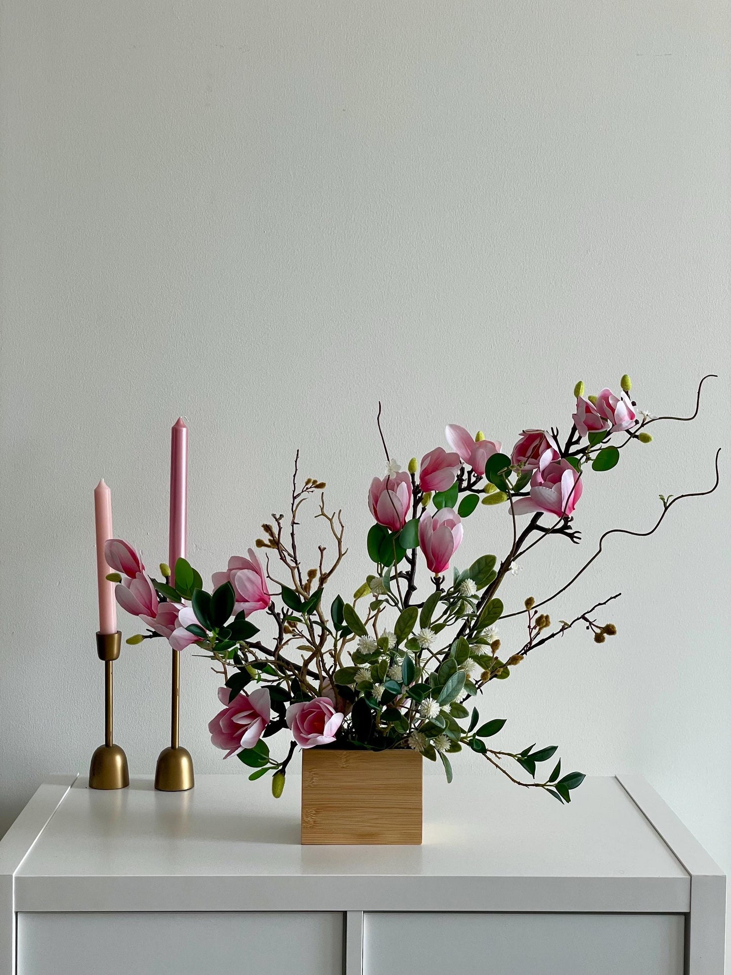 Silk Magnolia Centerpiece: Japanese Minimalist Floral Arrangement in Wood Vase