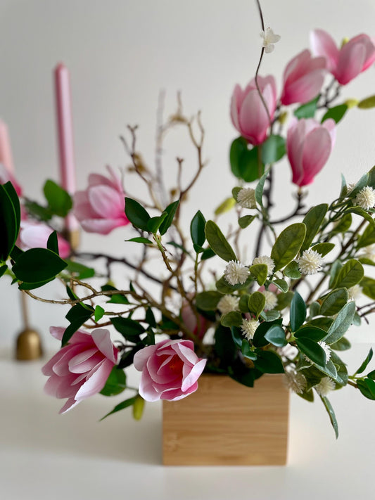 Silk Magnolia Centerpiece: Japanese Minimalist Floral Arrangement in Wood Vase